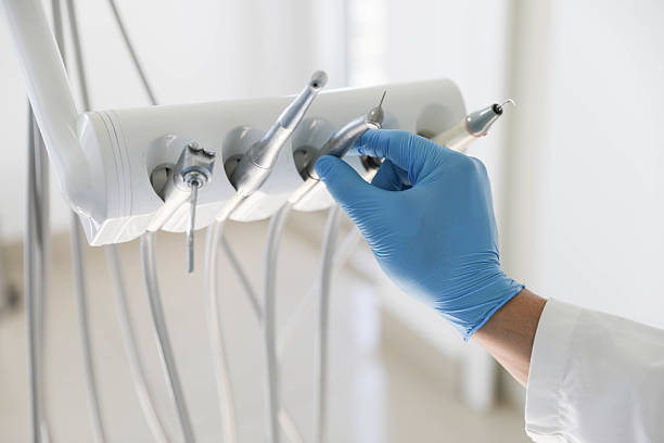 Professional Tooth Extraction technician working in Gold Hill, OR